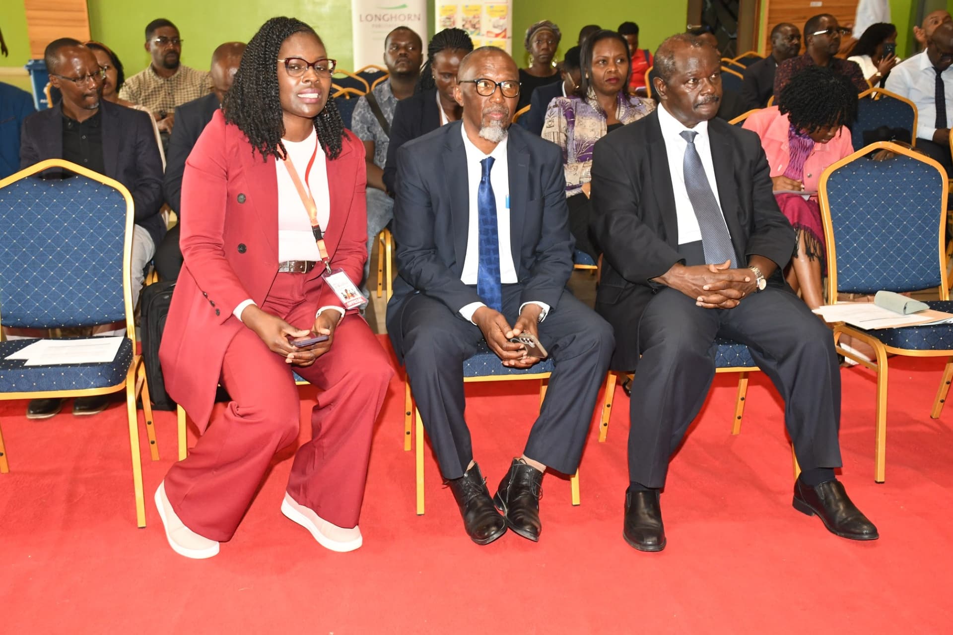 Eng. Mumina Wa-Kyendo seated in the front row with guests at the book launch