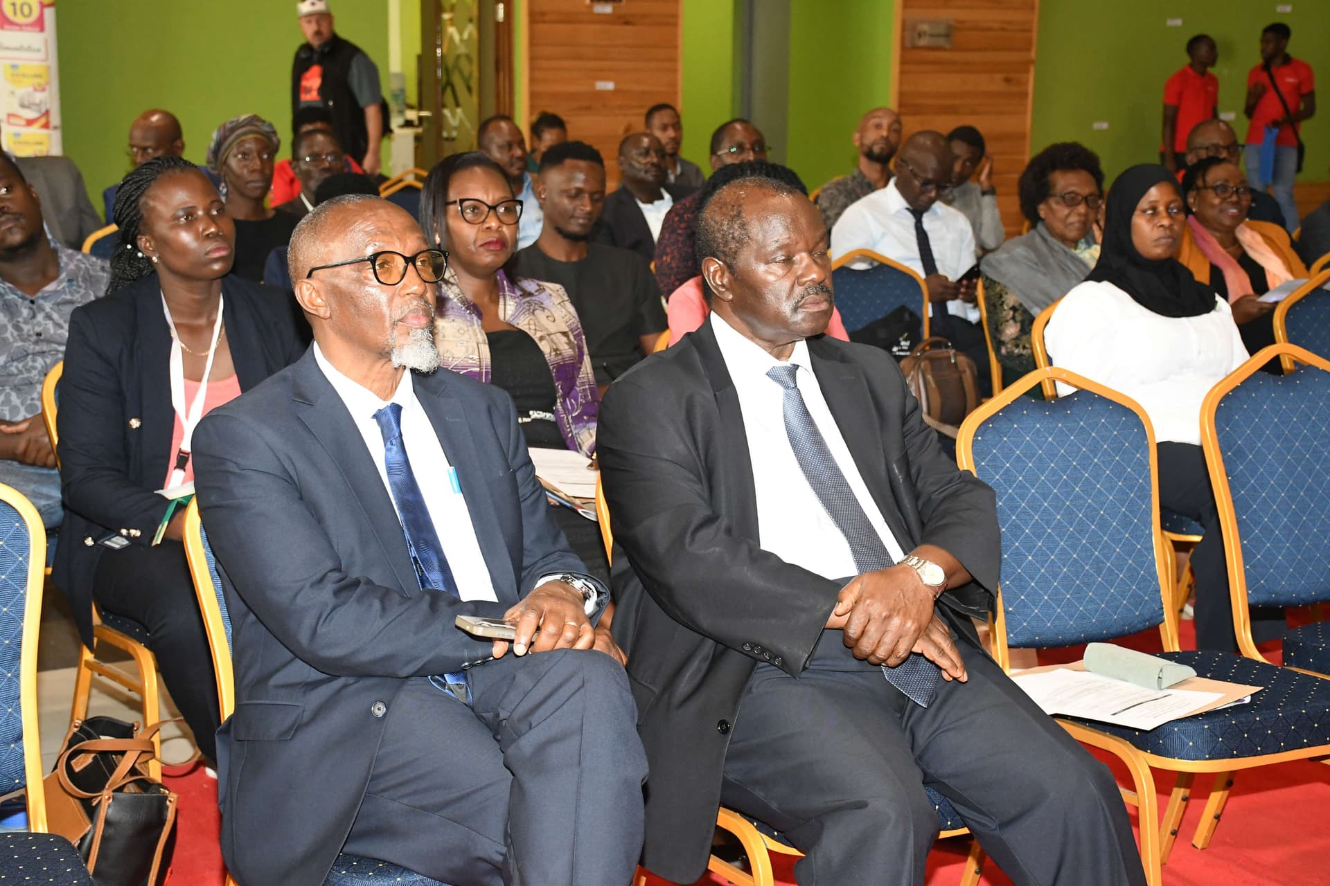Audience seated at the book launch with Eng. Mumina Wa-Kyendo in the front row